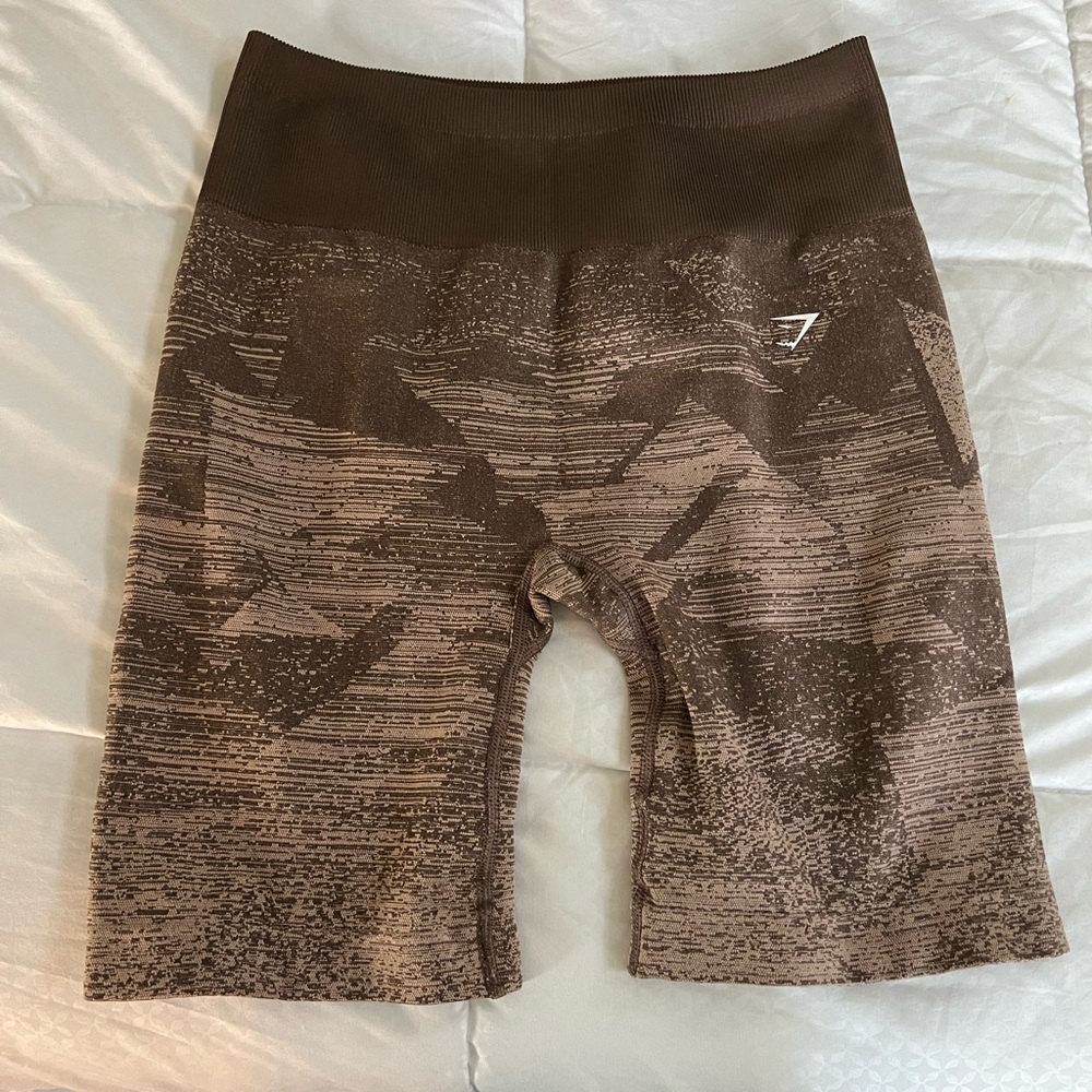 Rust colored Gymshark biker shorts. True to size. Never been worn